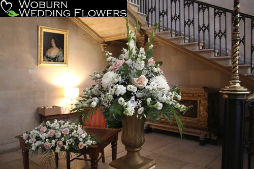 Blush and white Pedestal and Registrars table arrangement