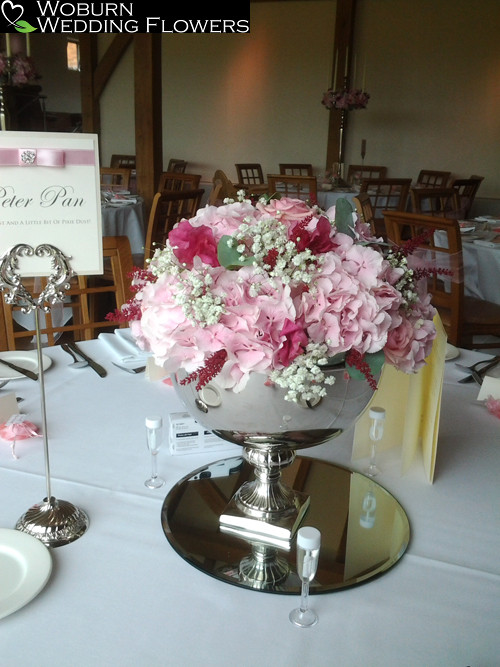 Urn arrangement of Roses, Hydrangea, Gypsophillia and Lizzianthus