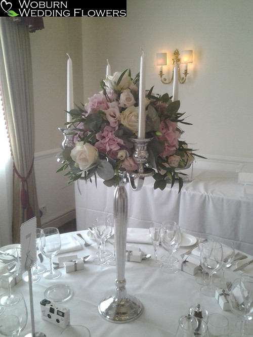 Rose, Hydrangea and Lizzianthus candleabra at the Woburn Hotel.