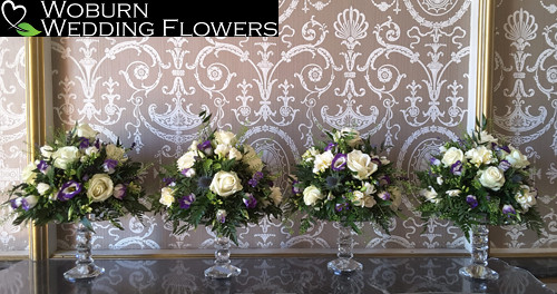 Rose and Lizzianthus crystal stand arrangements at Wrest Park.