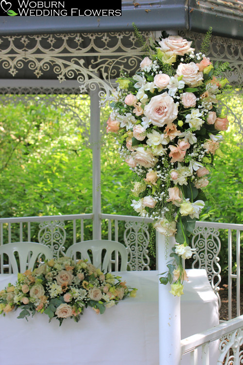 Close up of woodland glade Gazebo and registrars table arrangements