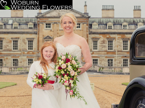 Classic shower bouquet and flower girl at Woburn Abbey.