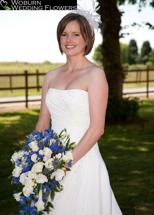 Shower bouquet with Rose, Lizzianthus, Delphinium and Calla Lilly.