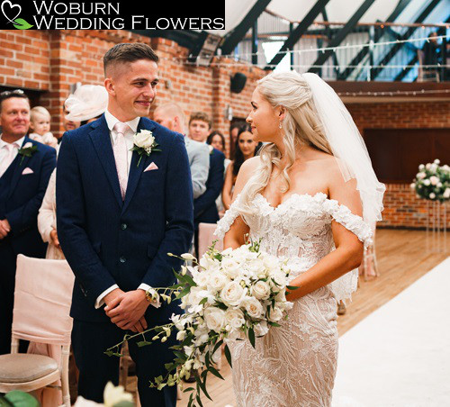 Gorgeous wired Rose and Orchid cascade bouquet at Eversholt village hall.