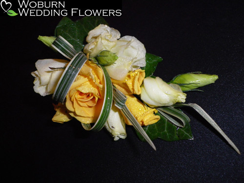 Rose and Lizzianthus bouteniere.