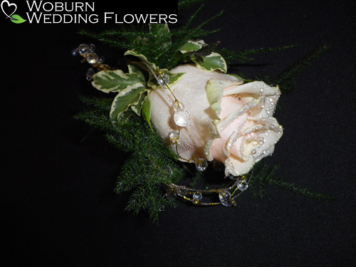 Rose and crystal buttonhole.