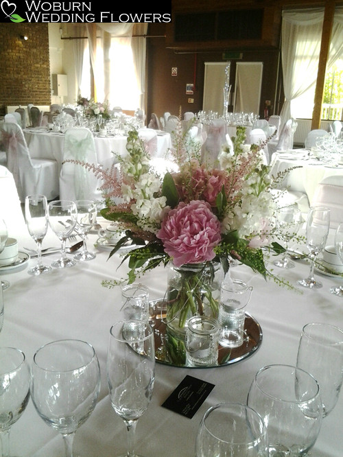 Vase arrangement of Stocks and Peonies at Woburn Safari Lodge.