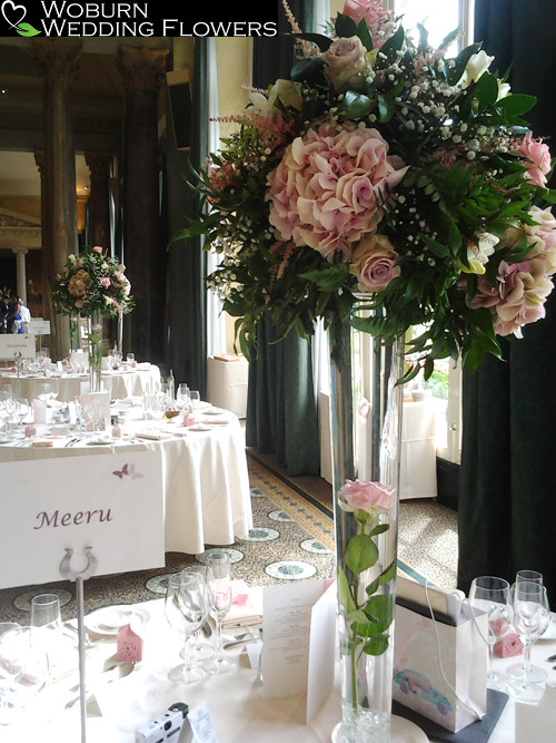 Tall vase arrangements with Hydrangea and Roses at Woburn Sculpture Gallery.