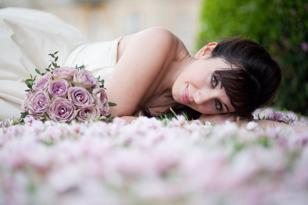 bride with lilac wedding bouquet