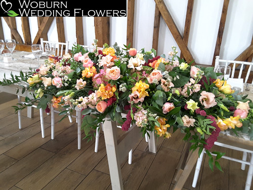 Top table of Roses, Stocks, Lizzianthus and Fresia