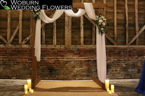 Romantic wedding arbour in the Oak Barn