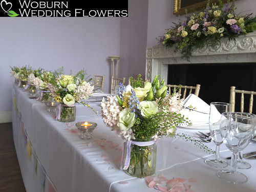 Spring flowers top table arrangements in the drawing room.