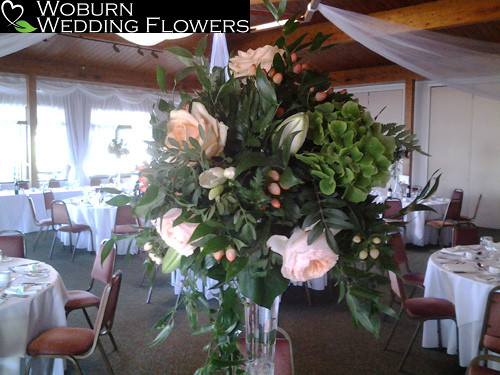 Hydrangea, rose, hypericum and lilly tall vase