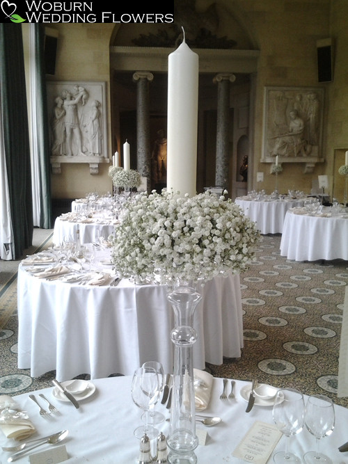 Massed gypsophillia and large candle arrangements.