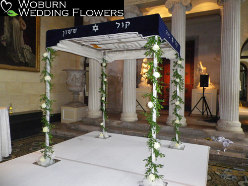 Rose decorated mandap at the temple end.