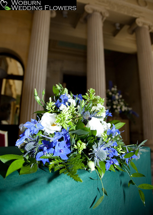 Delphinium, thistle, phlox and lizzianthus registrar's table at the temple end