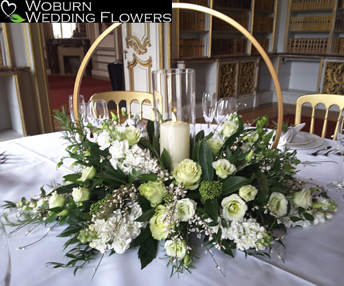 Hoop arrangement with stocks, roses and lizzianthus