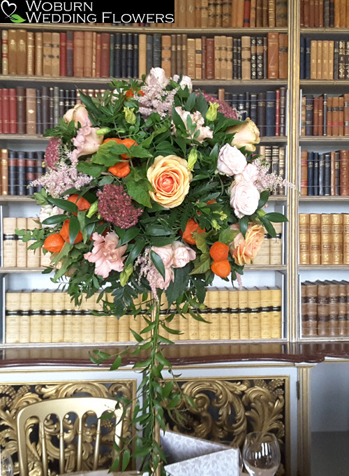 Rose, astilbe and lizzianthus tall stand in the library